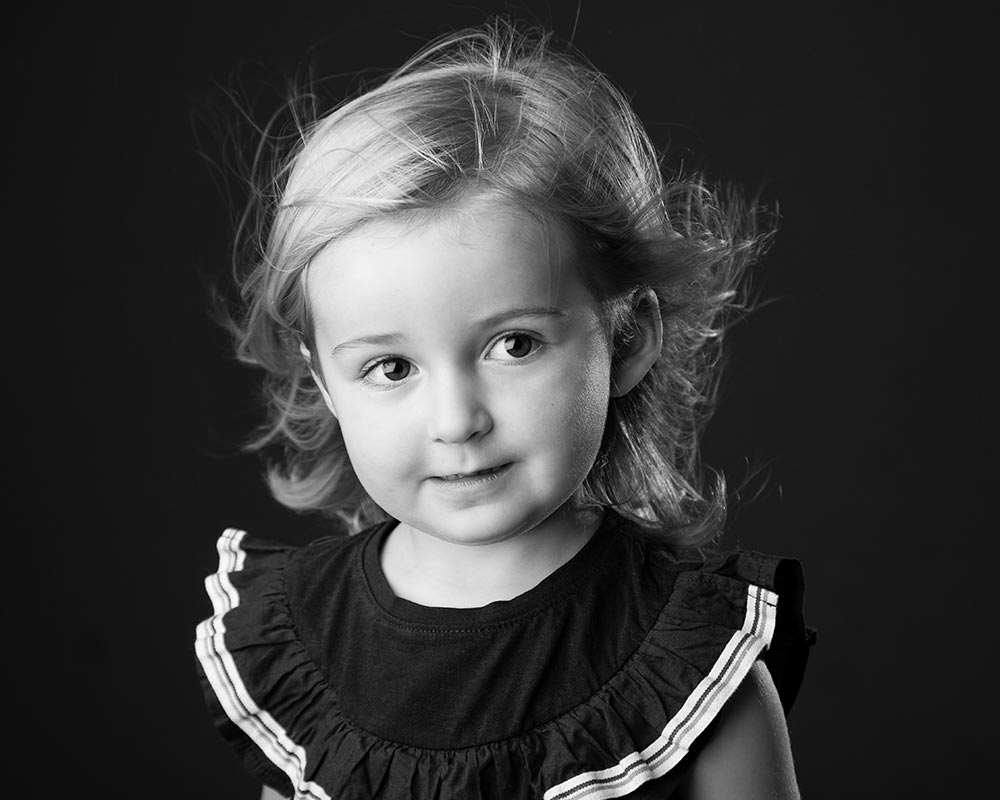 Little girl in photography studio