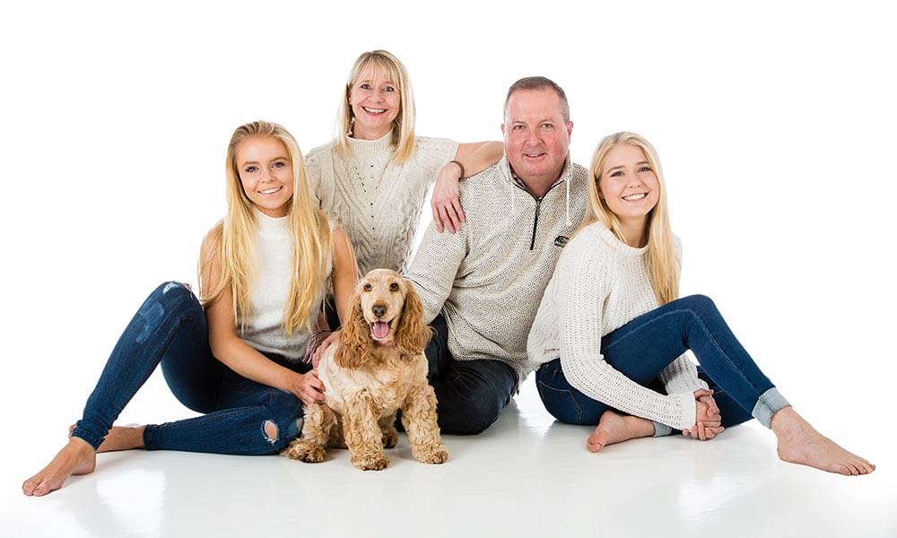 Family in studio with dog